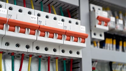 Side view of the power switch in the electrical control cabinet